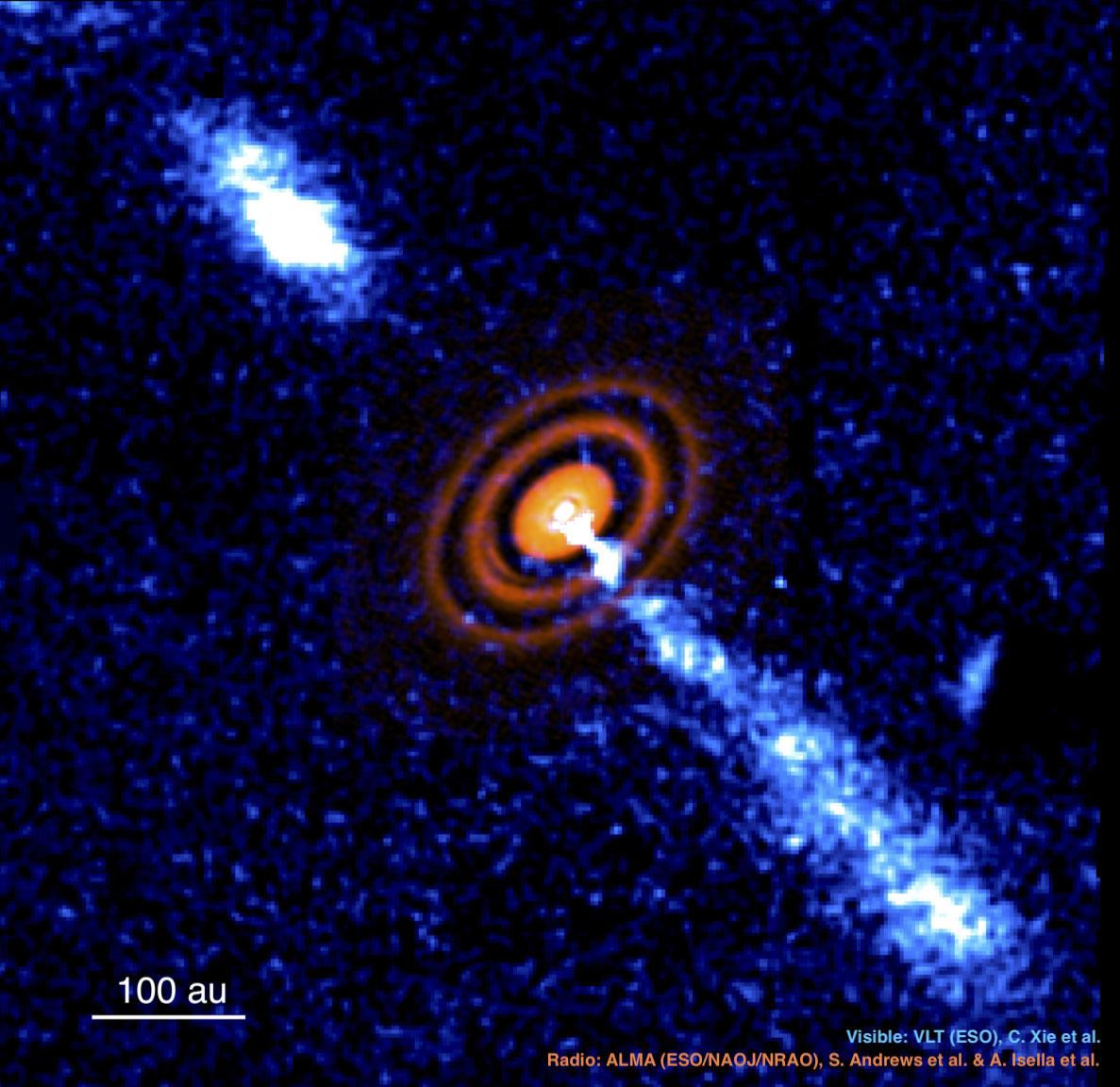 صورة للنظام النجمي HD 163296 تظهر قرصاً فيه فجوات وتدفّقين، التقطت بالأشعّة الراديويّة بواسطة "مصفوف أتاكاما المليمتري الكبير" (ALMA) والضوء المرئي بواسطة "التلسكوب الكبير جدّاً" (VLT)