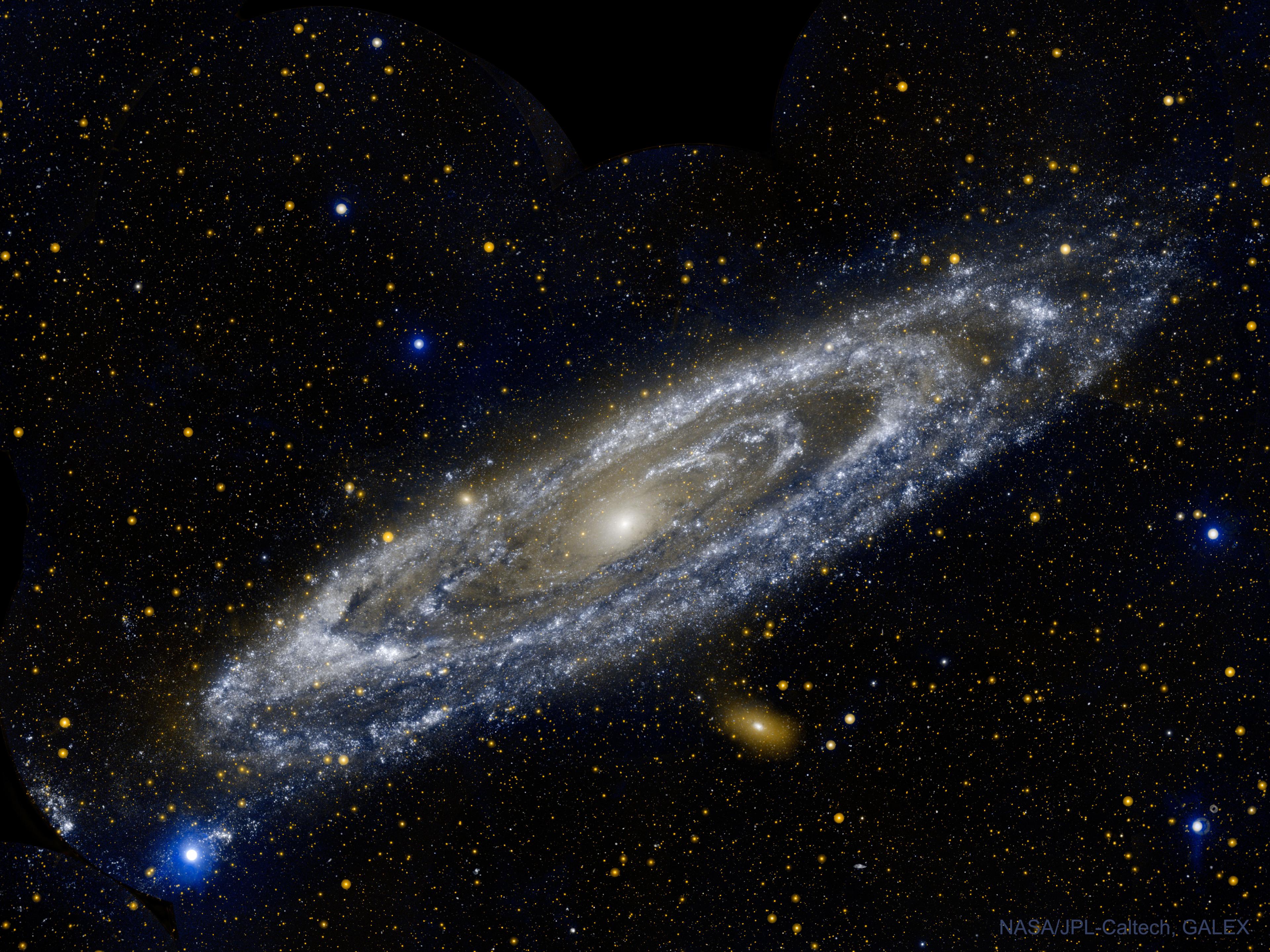 صورة تظهر مجرّة المرأة المسلسلة م31، كما تم تصويرها من المرصد الفضائي GALEX التابع لناسا بالأشعّة فوق البنفسجيّة.