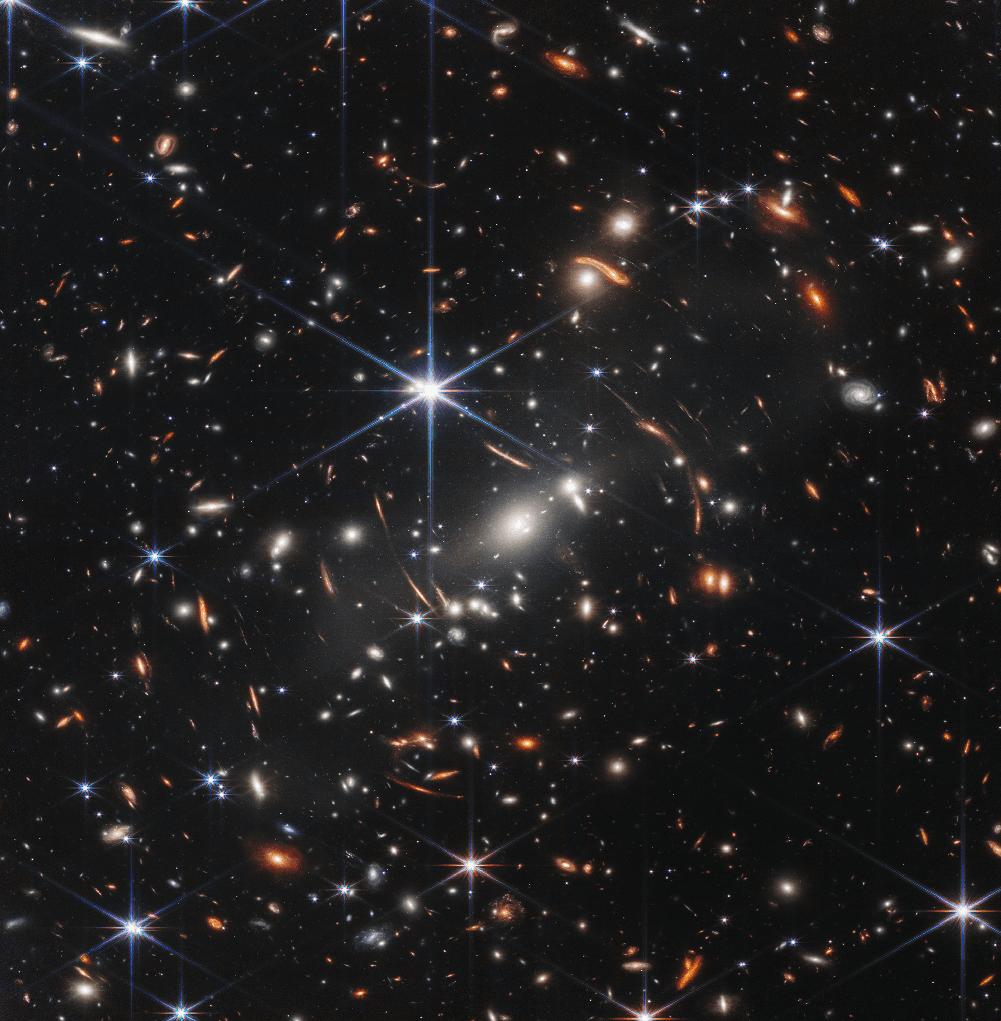 صورة للكون العميق جدّاً تحوي مجرّات كثيرة مختلفة وتظهر بعض نجوم المقدّمة المدبّبة