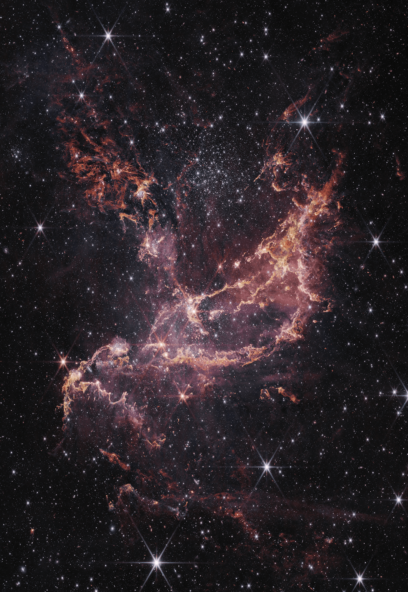 منطقة تشكّل النجوم الفتيّة الأكبر في سحابة ماجلّان الصُّغرى وفيها عنقود النجوم الفتيّ "إن‌جي‌سي 346"، ويظهر الانبعاث من الهيدروجين الذرّي المُتأيّن والهيدروجين الجُزيئي والغبار مُفَصَّلاً بتدرُّجاتٍ ورديّة وبرتقاليّة.